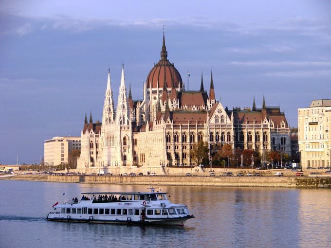Parliament Building and Cruise Boat along Danube River at Sunset - From Buda Side