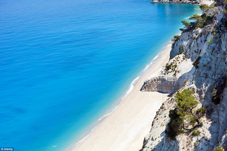 In Lefkada, Greece, the stunning Egremni Beach offers pristine sandy beaches and out-of-this-world turquoise water