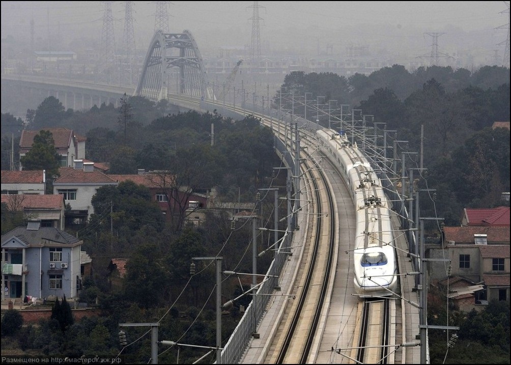 A high-speed train travels on the new Wuhan-Guangzhou railway in Wuhan