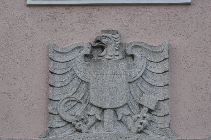 Coat of arms of the republic of austria. On a wall royalty free stock photos