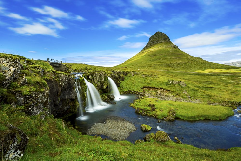 green hills and waterfalls by Kirkjufell mountain,Iceland 
